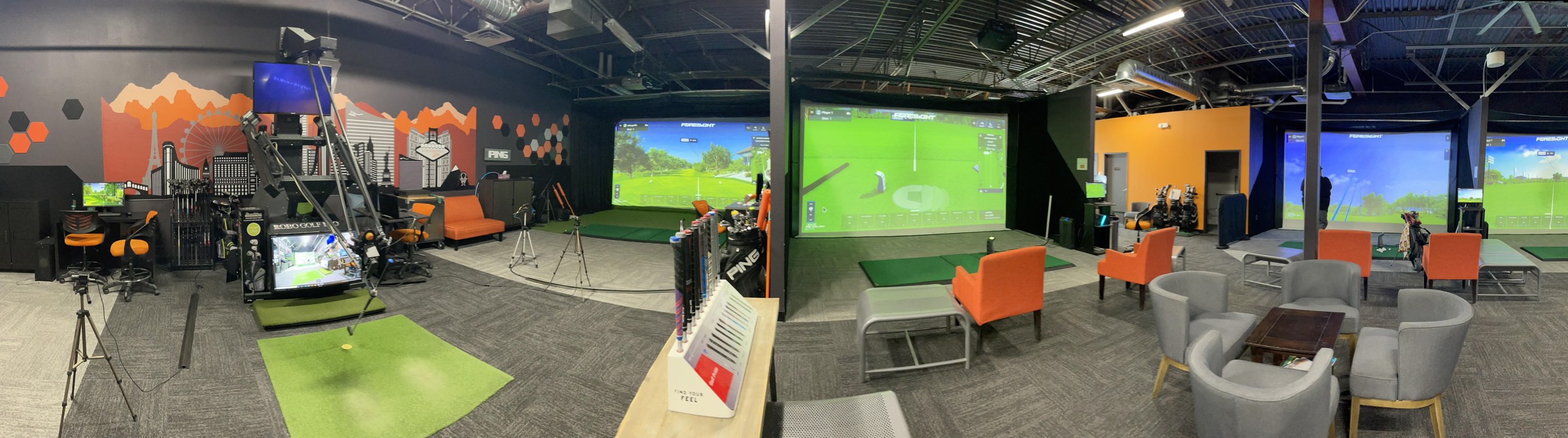 RoboGolfPro swing robot and indoor golf simulator bays in Las Vegas
